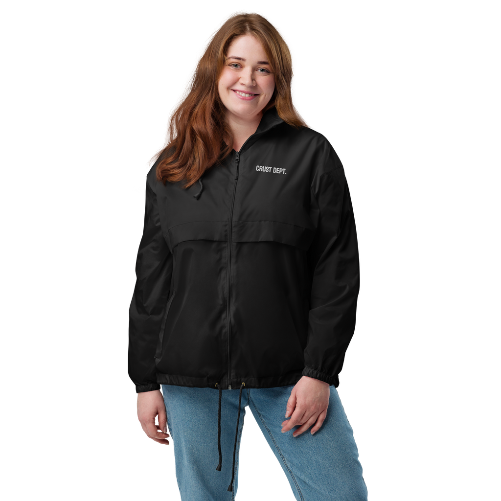 Person wearing a black jacket with a logo on a white background