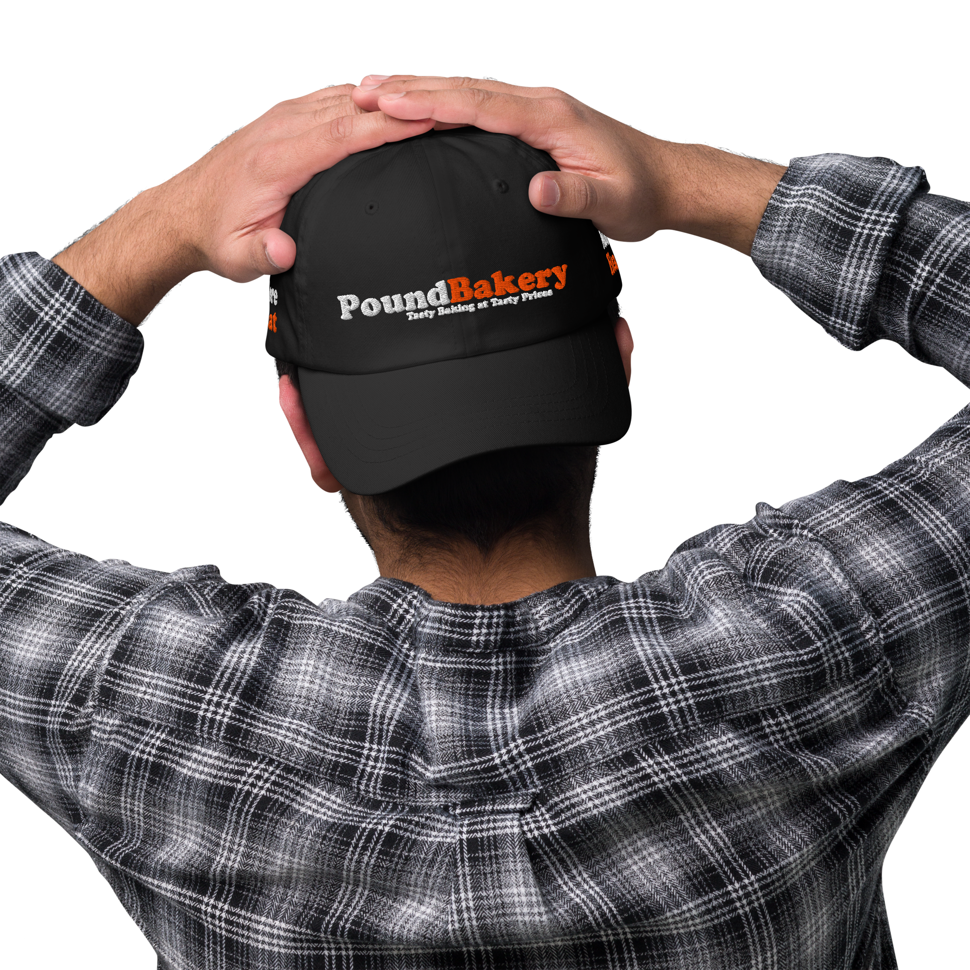 Person wearing a black cap with 'PoundBakery' logo on a white background