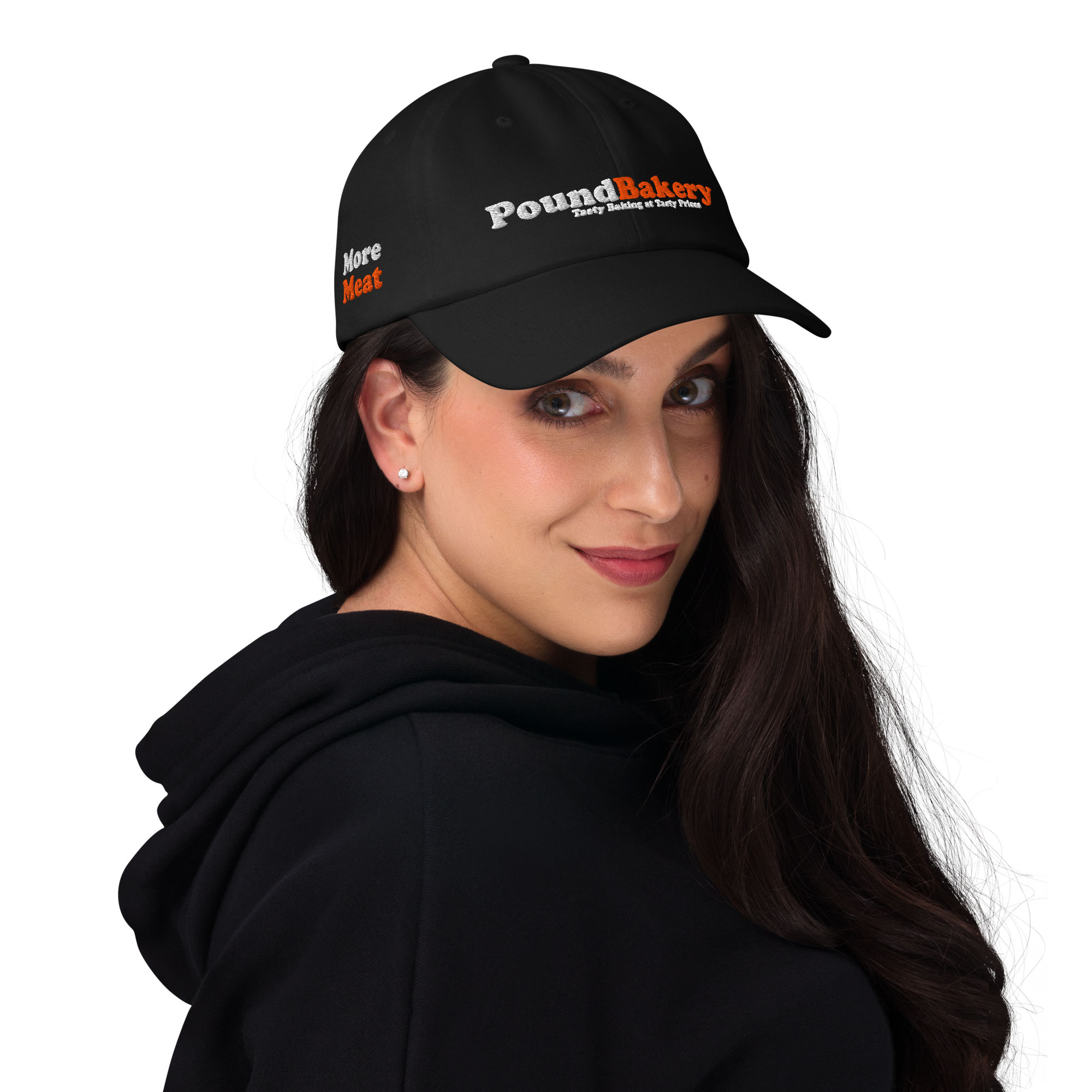 Woman wearing a black cap with 'Pound Bakery' logo on a white background
