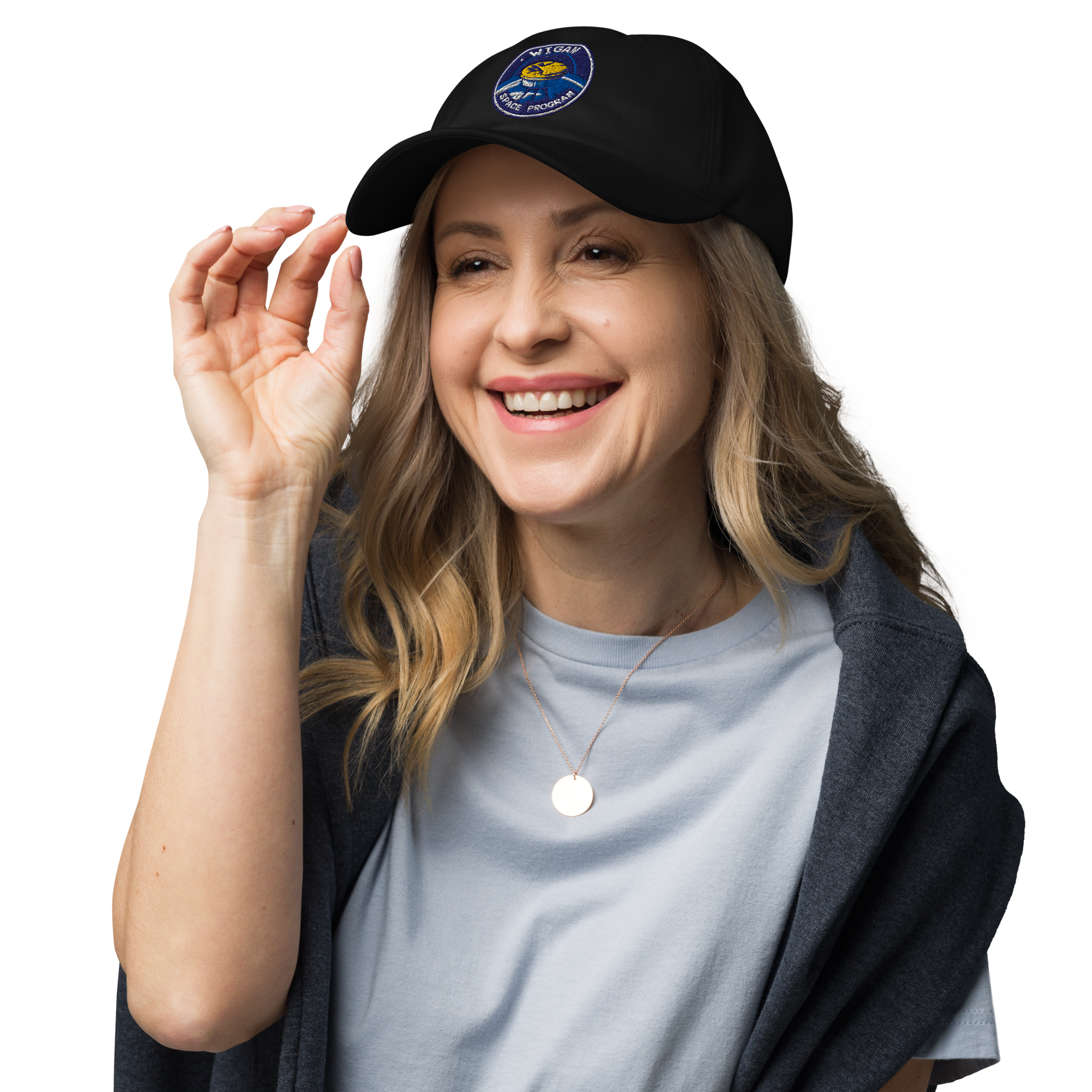 Woman wearing a black cap with a logo, smiling on a white background