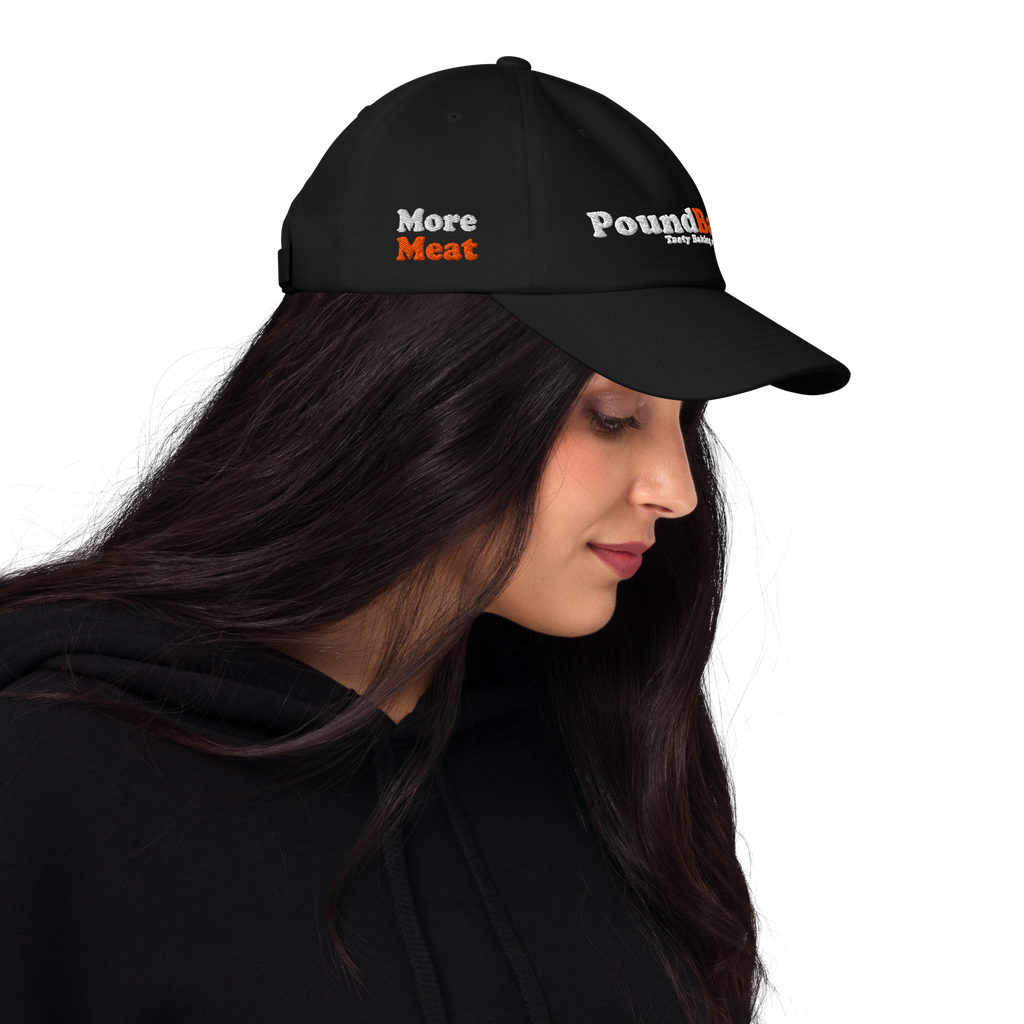 Black cap with text worn by a person on a white background