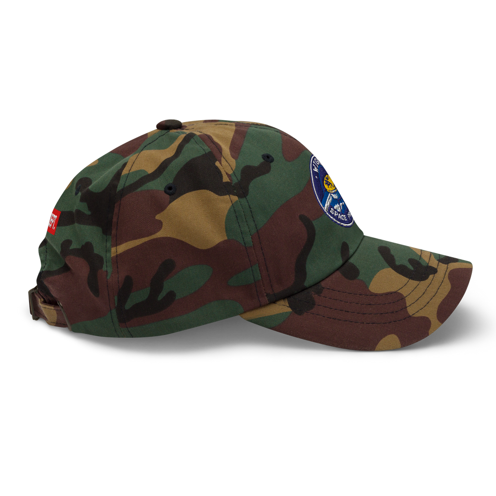 Camouflage baseball cap with a patch on a white background
