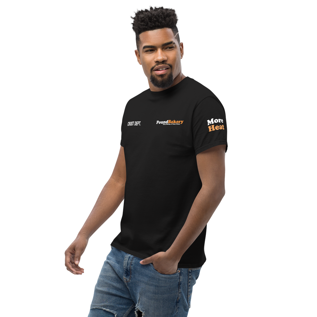Man wearing a black t-shirt with branding on a white background