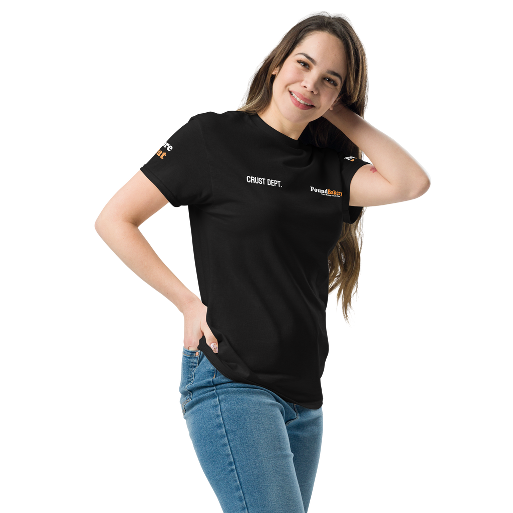Woman wearing a black t-shirt with text and logos on a white background