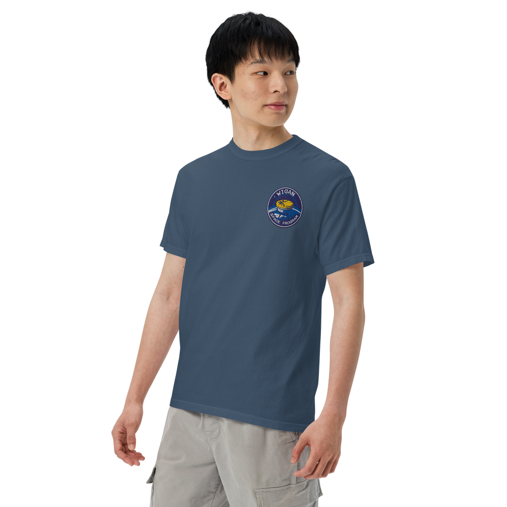 Person wearing a blue t-shirt with a logo on a white background