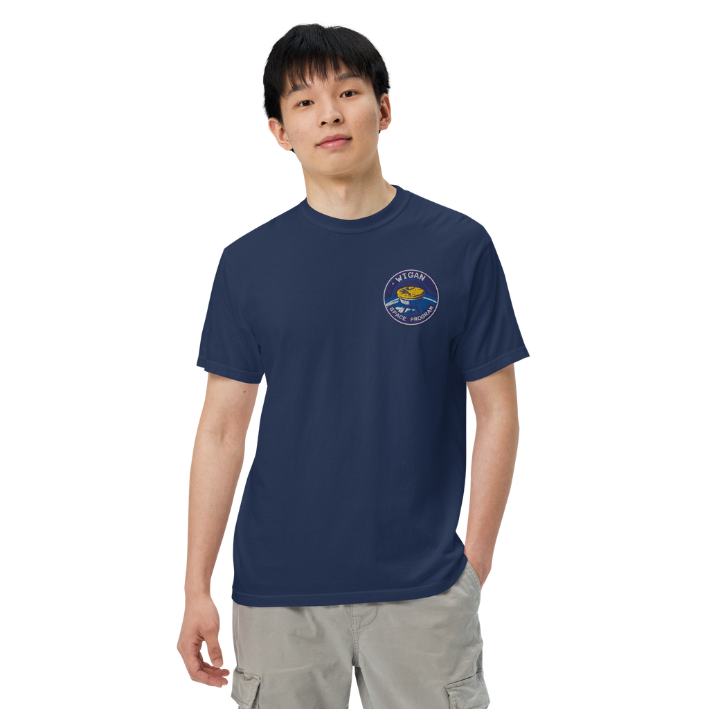 Person wearing a navy blue t-shirt with a logo on a white background